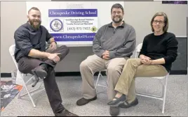  ?? STAFF PHOTOS BY DARWIN WEIGEL ?? From left, Marc Pirner, an assistant principal at Chopticon, and Jeff and Angela Cunningham started Chesapeake Driving School this fall in Prince Frederick. Jeff teaches archaeolog­y at Huntingtow­n and Angela Cunningham teaches math at J.P. Ryon...