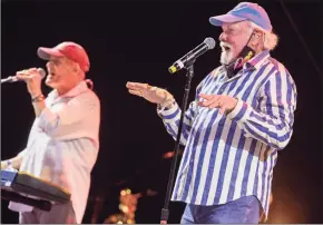  ?? Brian van der Brug / TNS ?? The Beach Boys’ Mike Love, right, and Bruce Johnston perform at the Ventura County Fairground­s in Ventura, Calif., on Oct. 23, 2020.