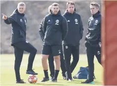  ??  ?? Solskjaer (left) and players attend a training session at the Carrington training ground in greater Manchester, north west England on the eve of their UEFA Champions League quarter final first leg football match against Barcelona. — AFP photo