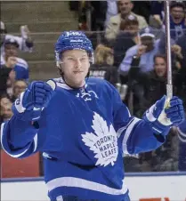  ?? CARLOS OSORIO, TORONTO STAR ?? Maple Leafs’ Connor Brown celebrates his 15th goal of the season in the first period against the New York Rangers at the Air Canada Centre in Toronto on Thursday night. For the result, see thespec.com.