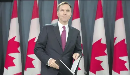  ?? ADRIAN WYLD/THE CANADIAN PRESS ?? Minister of Finance Bill Morneau delivers a fiscal update from the Liberal government on Friday.