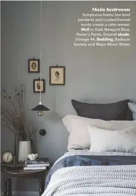  ??  ?? Main bedroom Sumptuous linens, low level pendants and curated framed works create a calm retreat. Wall in Dark Newport Blue, Porter’s Paints. Enamel shade, Vintage 44. Bedding, Bedouin Societe and Major Minor Wares