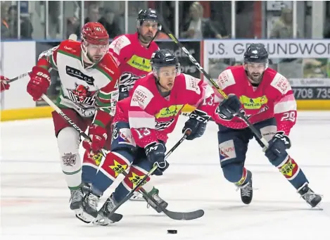  ?? Picture: Derek Black. ?? Dundee Stars’ Egils Kalns begins another attack against Cardiff Devils’ defence last night.