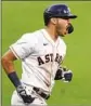  ?? Ashley Landis Associated Press ?? CARLOS CORREA forces a Game 6 today.