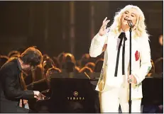  ?? (AP) ?? Kesha performs ‘It Ain’t Me Babe’.