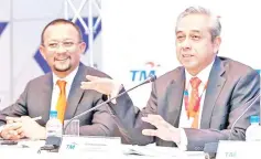  ??  ?? Bazlan (right) and Imri said the rollout will take time, as TM has over 800,000 Unifi Home subscriber­s.