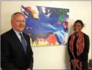  ?? CARL HESSLER JR. — DIGITAL FIRST MEDIA ?? Montgomery County Chief Public Defender Dean M. Beer and Deputy Chief Public Defender Keisha Hudson admire some of the children’s artwork donated to office through Fresh Artists program.