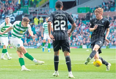  ??  ?? CELTIC CLINCHER: James Forrest fires home the Hoops’ winner in last season’s cup clash with Dunfermlin­e.