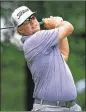  ?? VAUGHN RIDLEY / GETTY IMAGES ?? Charley Hoffman tees off at No. 11 in his round of 7 under at the RBC Canadian Open.