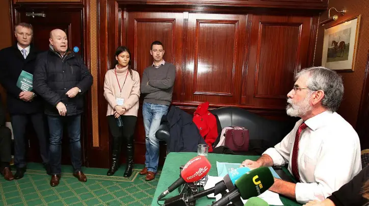  ??  ?? CONFRONTAT­ION: Austin Stack, son of murdered prison officer Brian Stack, confronts Sinn Fein leader Gerry Adams at the Sinn Fein launch of its Brexit document last week. Photo: Tom Burke