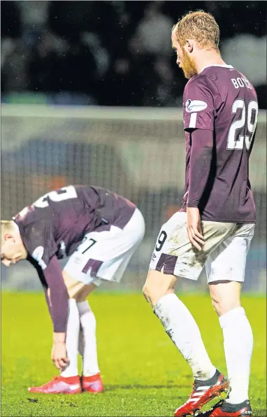  ??  ?? Hearts’ Liam Boyce troops off after losing 1-0 to St Mirren in Paisley on March 11. The result that ultimately looks like sending the Jambos down