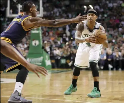  ?? ELISE AMENDOLA — THE ASSOCIATED PRESS ?? Celtics guard Isaiah Thomas looks to pass the ball during Game 2 of the Eastern Conference finals.