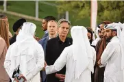  ?? KARIM JAAFAR VIA AP ?? U.S. Secretary of State Anthony Blinken, center, listens to officials during a visit to Oxygen Park at Education City, in Doha, Qatar, Monday.