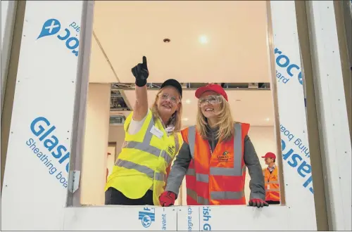  ?? PICTURE: BRUCE ROLLINSON ?? THE FUTURE: Chief executive Rosie Toogood with Housing Minister Esther McVey at the modular-housing factory in Sherburn-in-Elmet near Leeds yesterday.