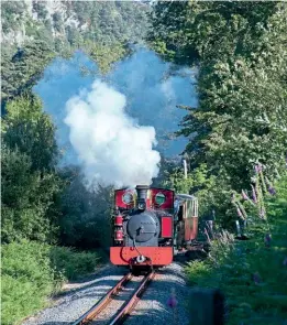  ?? ?? Hunslet 2-6-2T back in its element, hauling a test train on the Welsh Highland Railway on July 9. CHRIS PARRY