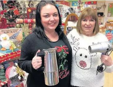  ??  ?? Theresa Smith and Gillian Talbot with gifts that can be recycled for Barnardo’s Cymru