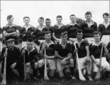  ??  ?? Here’s a detail from a photo of the Newmarket hurlers of 1963, when helmets hadn’t yet found favour.