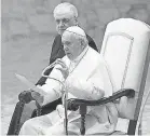  ??  ?? Pope Francis reads his message during the weekly general audience at the Vatican on Wednesday. AP