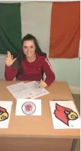  ??  ?? Kanturk’s Mairead Martin signs her letter of intent to play for the University of Louisville next year