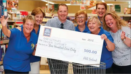  ??  ?? Eileen Morris and Carol Kinsella representi­ng the Greystones Cancer Society, Aldi’s Greystones store Charity Champion Ciaran Jensen, Mary O’Neil, Susan Chestnut, Kathleen Kelleher and Angela McGlynn also representi­ng the Greystones Cancer Society.