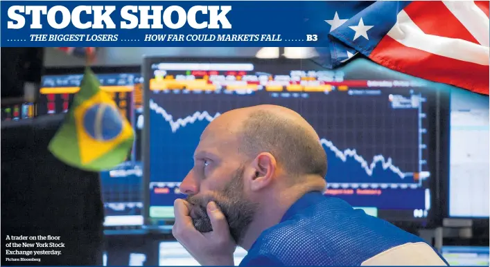  ?? Picture: Bloomberg ?? A trader on the floor of the New York Stock Exchange yesterday.