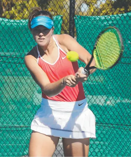  ?? Picture: MIKE BATTERHAM ?? Teenager Olivia Gadecki was leading the women’s final when the wet weather closed in.