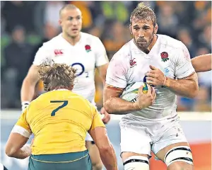  ??  ?? Body on the line: Chris Robshaw made 18 tackles in a rousing display that helped put Australia on the back foot