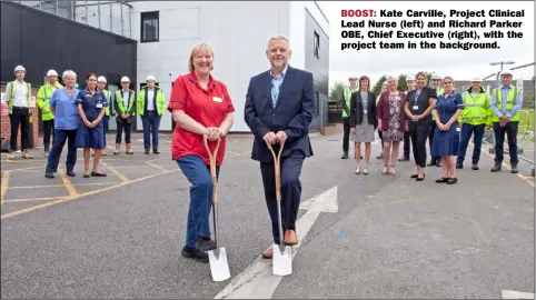  ?? ?? BOOST: Kate Carville, Project Clinical Lead Nurse (left) and Richard Parker OBE, Chief Executive (right), with the project team in the background.