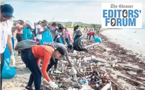  ?? FILE ?? Volunteers taking part in a beach clean-up project at Hellshire Bay Beach on Internatio­nal Coastal Clean-up Day in 2017.