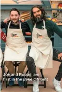  ??  ?? Jon and Russell are first in the Bake Off tent