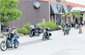  ?? ALLAN BENNER/STANDARD STAFF ?? About two dozen bikers took part in Big Brothers Big Sisters St. Catharines - Thorold and District, on Saturday.