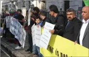  ??  ?? Members of Free Balochista­n Movement protest in London against China’s presence in Balochista­n.