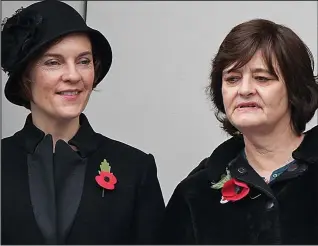  ??  ?? Labour ladies: Justine Miliband, in a 1920s-style hat, and Cherie Blair