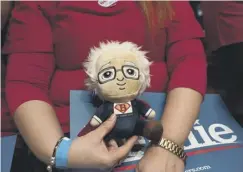  ??  ?? 0 Soft toy of Democratic presidenti­al hopeful Sen Bernie Sanders