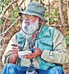  ??  ?? Dr. Anslem de Silva at the Wilpattu National Park during the crocodile survey a few years ago. Pic by Suraj Gunawardan­a