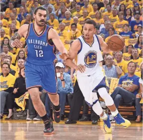  ?? KYLE TERADA, USA TODAY SPORTS ?? Warriors star Stephen Curry, right, working against the Thunder’s Steven Adams, finished with 28 points, including five three-pointers, in Wednesday’s win.