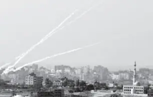  ??  ?? The Israeli army said on Wednesday morning that its fighter jets bombed several targets in the besieged Gaza Strip.