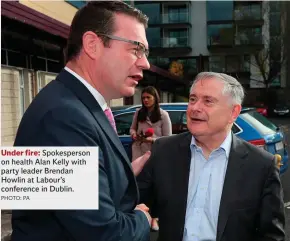  ?? PHOTO: PA ?? Under fire: Spokespers­on on health Alan Kelly with party leader Brendan Howlin at Labour’s conference in Dublin.