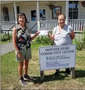  ?? PHOTO BY TED JONES ?? Blue Lake Mayor Adelene Jones, left, hands a donation from the citizens of Blue Lake who signed up for the map used at the Blue Lake Citywide Yard Sale to Kim Rios of the Blue Lake Community Resource Center.