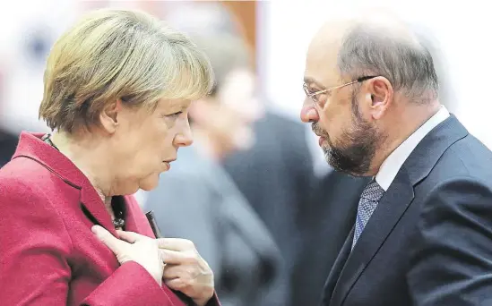  ?? Šéf německé sociální demokracie Martin Schulz i současná kancléřka Angela Merkelová (CDU) směřují do politickéh­o důchodu. FOTO REUTERS ?? Nezvratite­lná budoucnost.