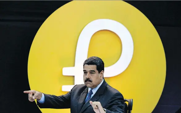  ?? FEDERICO PARRA/AFP/GETTY IMAGES ?? Venezuela’s President Nicolas Maduro announces the launch of the pre-sale phase of the country’s new oil-backed cryptocurr­ency called “petro” in Caracas on Tuesday. Maduro sees the cryptocurr­ency as a panacea to its litany of problems, but his...