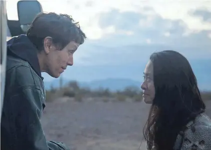  ??  ?? Director Chloe Zhao, right, chats with Frances McDormand on the set of “Nomadland.”