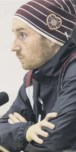  ??  ?? 2 Hearts manager Ian Cathro, faces the media yesterday when he welcomed the re-turfing of the Tynecastle pitch. Below left, the surface was again the subject of concern against Inverness on Saturday.