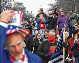  ?? Matt McClain / Washington Post ?? Trump supporters gather in Washington, D.C., on Jan. 5. The rallies that led to that day’s storming of the Capitol were organized by establishe­d D.C. insiders.