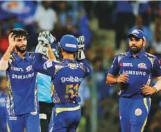  ?? AP ?? Mumbai Indians Mayank Markand (left) celebrates the wicket of Mohammad Nabi. The leg-spinner claimed two wickets for 15 runs off three overs.