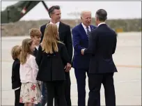  ?? EVAN VUCCI THE ASSCIATED PRESS ?? President Joe Biden greets Eric Garcetti, Mayor of Los Angeles, right, as California Gov. Gavin Newsom, Dutch William Siebel Newsom, 6, Hunter Siebel Newsom, 10, Montana Tessa Siebel Newsom, 11, Brooklynn Siebel Newsom, 8, look on after arriving at LAX on June 8, 2022, in Los Angeles.