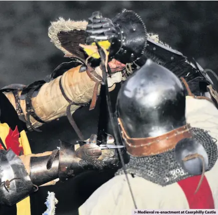  ??  ?? > Medieval re-enactment at Caerphilly Castle