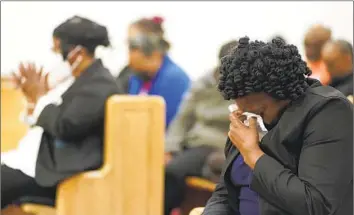  ?? Sean Rayford Associated Press ?? ELDER Shannon Hammond in Scranton, S. C., mourns during a vigil last week for the group of four people attacked on a medical visit to Mexico. Two of the group were killed in violence blamed on a drug gang.