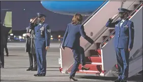  ?? (AP/Alex Brandon) ?? Vice President Kamala Harris boards Air Force Two upon departure from Dobbins Air Reserve Base in Marietta, Ga. Stories circulatin­g online have incorrectl­y asserting Harris disrespect­ed the military when she failed to salute the military escorts when boarding the plane. While Harris did not salute the troops, she is not required to.