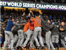 ?? Foto: Keith Brimingham, dpa ?? Im siebten und entscheide­nden Spiel gewannen die Astros auswärts bei den L.A. Dod gers die sogenannte World Series.